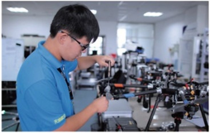 Student assembling a multi-rotor